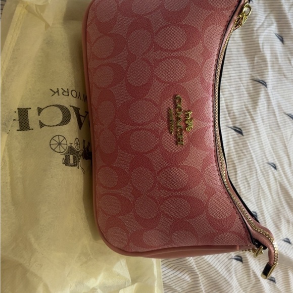 Coach Handbags - Coach Pink Signature Clutch